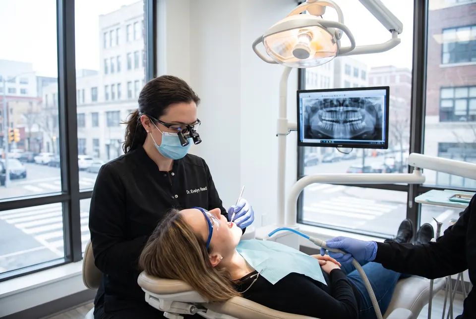 Dentist treating a patient booked through a Clickerr consultation